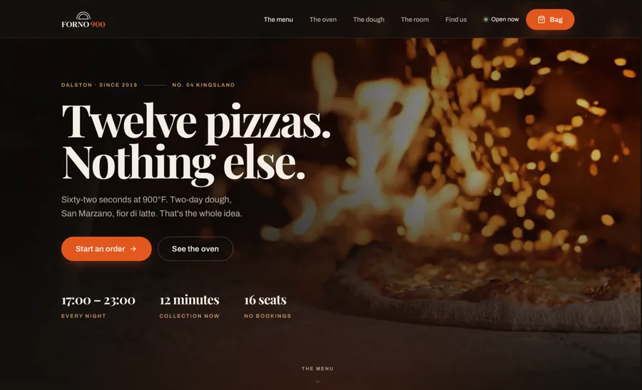 FORNO 900 home page: the headline &ldquo;Twelve pizzas. Nothing else.&rdquo; set over a dark photograph of a pizza in a wood-fired oven, with Start an order and See the oven buttons and a row reading 17:00 to 23:00 every night, 12 minutes collection, 16 seats no bookings